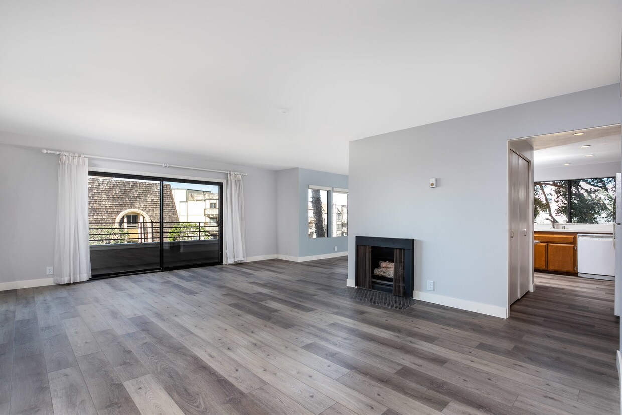 Gas fireplace and new vinyl, plank flooring - 700 Esplanade