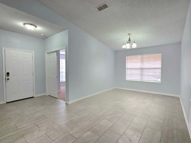 Building Photo - Charming 4BR/2BA Brick Home with Solar Panels