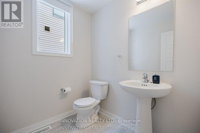 Photo du bâtiment - 105 Tonic Cres