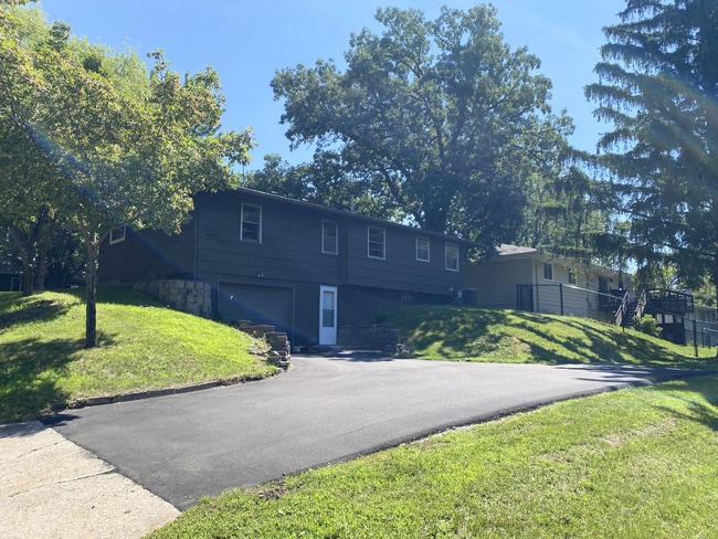 Back of home, tuck under single stall garage and parking pad - 521 3rd Ave N