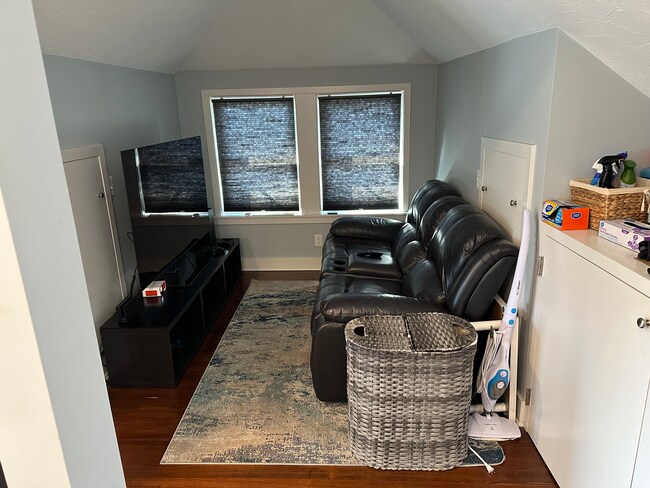 Right of the kitchen is a small living/dining area - 1193 Cranston St
