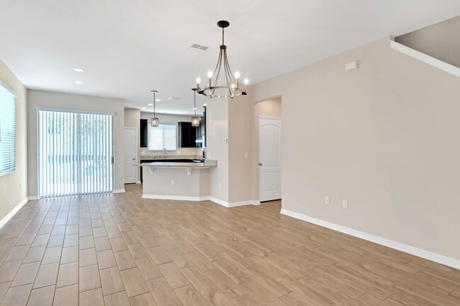 Building Photo - Spacious, Nearly New and Gated 3/2.5/2 Plu...