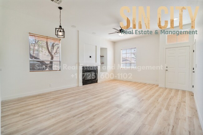 Building Photo - "Charming 3-Bed Oasis with Granite Touches & Cozy Fireplace in Las Vegas"
