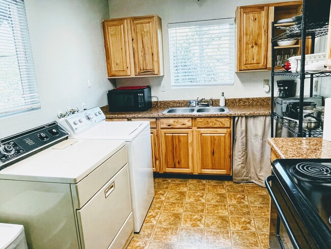 Washing machine and dryer - 2071 East St