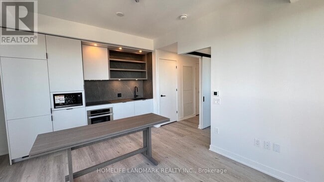 Building Photo - 55 Charles St E