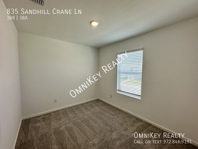 Foto del edificio - 835 Sandhill Crane Ln