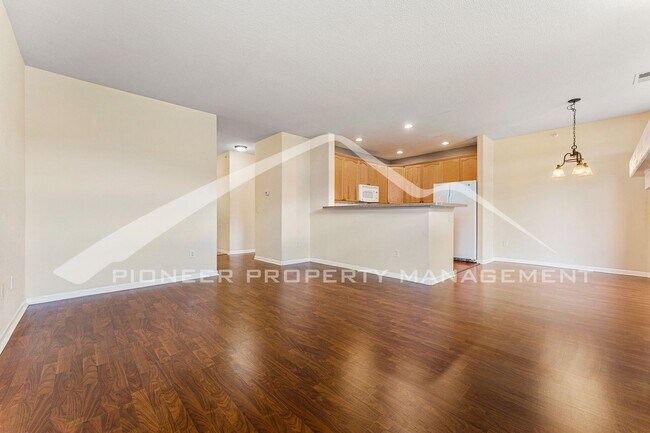Building Photo - Charming condo with Central AC and 1 Car Garage