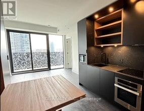 Building Photo - 55 Charles St E