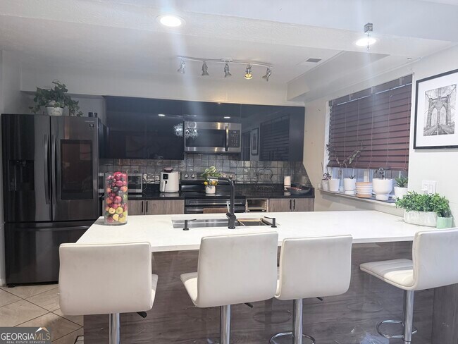 Foto del edificio - 6004 Green Yard Way