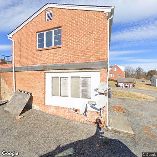 Primary Photo - Good Sized Apartment Below Business in Mad...